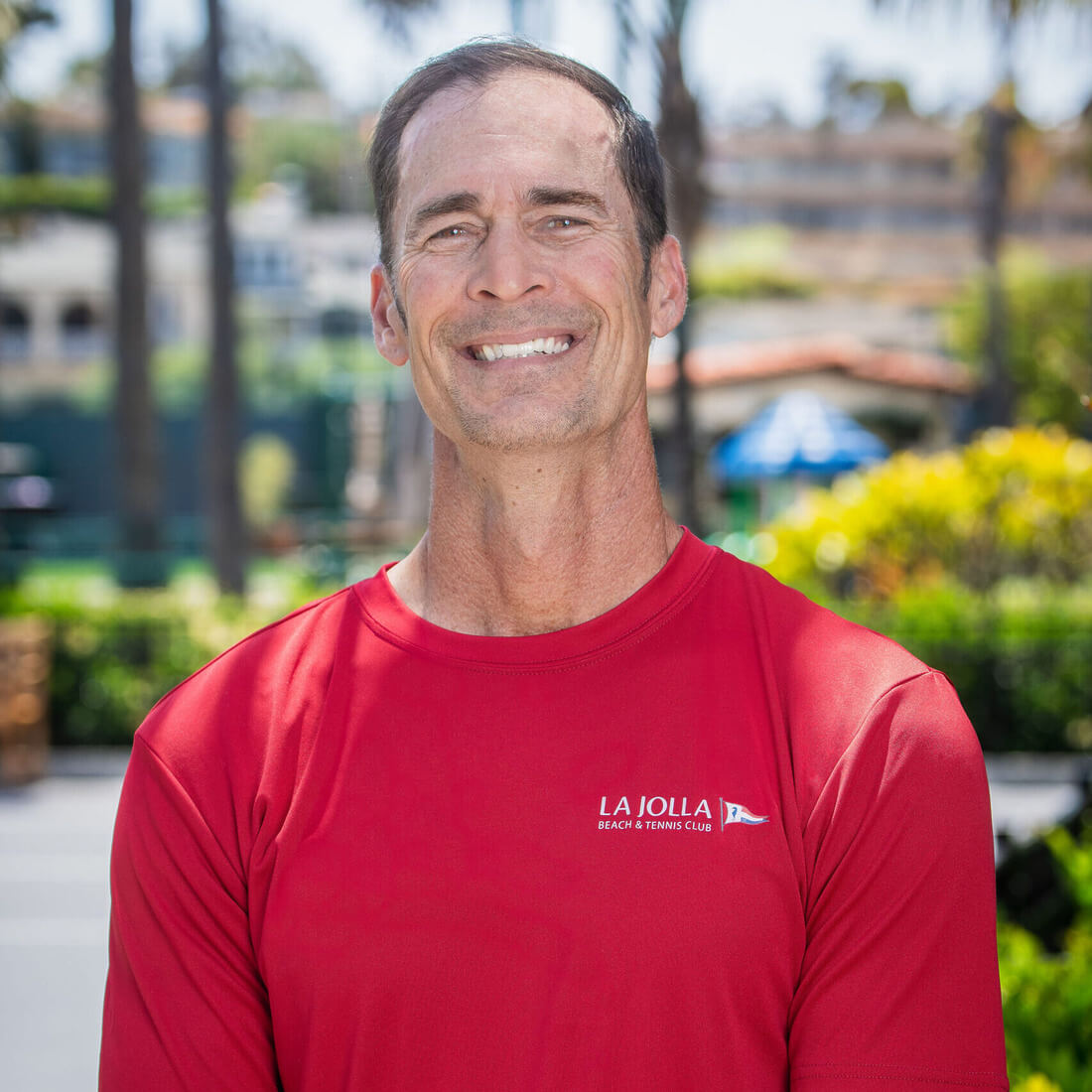 Man under palm trees in cap and t-shirt, quote "anytime we want to add something new..." by conan lorenzo
