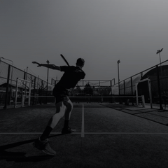 Man playing padel outdoors