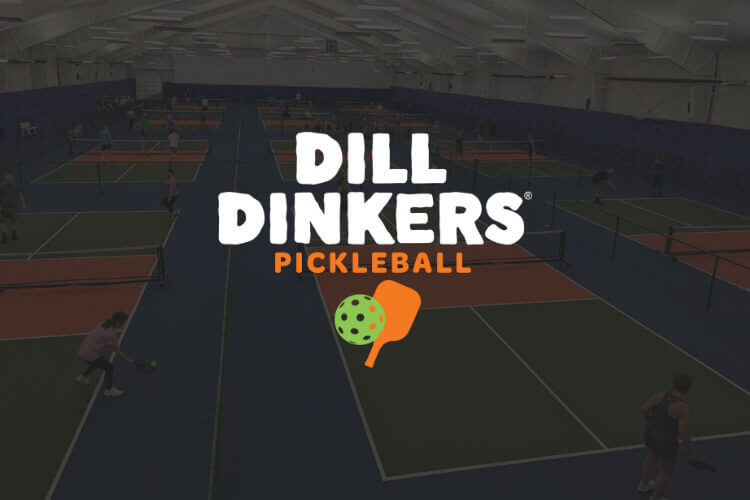 Indoor pickleball courts with players. Dill Dinkers logo overlayed
