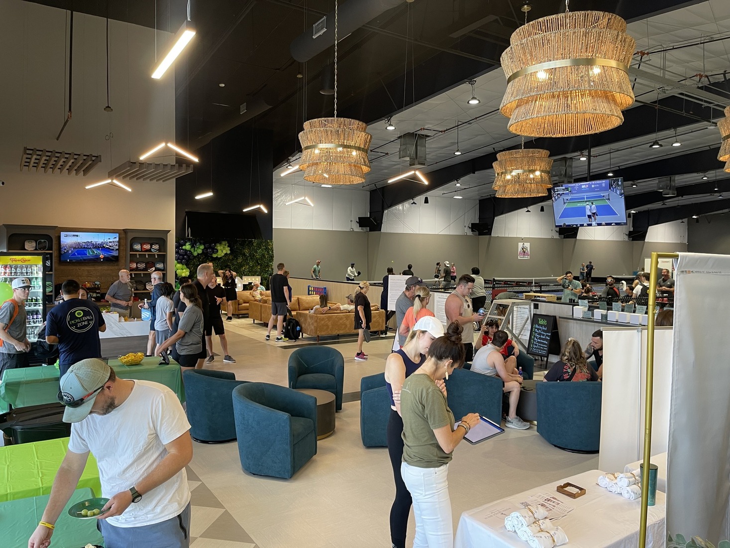 Pickleball Zone's lounge area filled with people on opening day