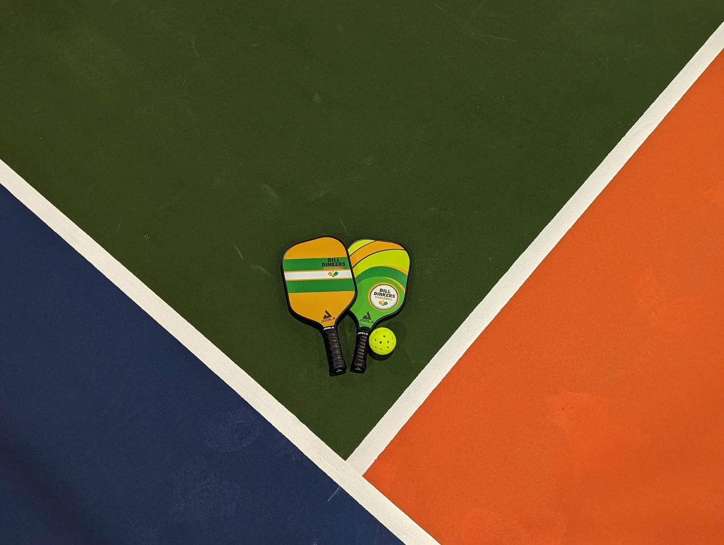 Image of Dill Dinkers pickleball branded paddles.