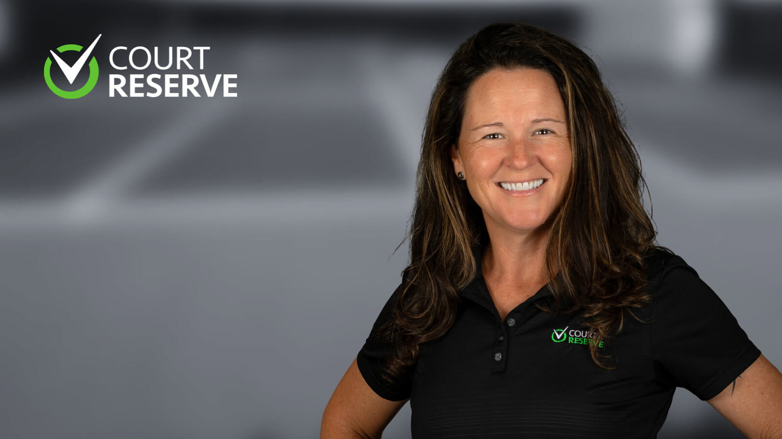 Woman looking at camera and smiling with CourtReserve logo top left