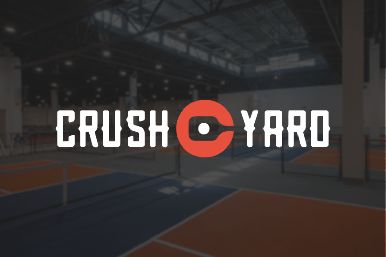 Crush Yard logo over indoor pickleball courts