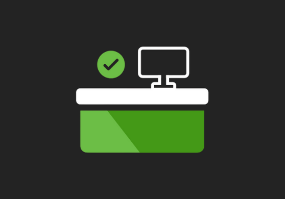 Front Desk Icon Computer monitor on desk with green check mark